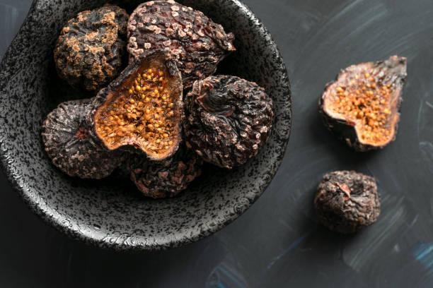 istock Dried Black Mission Figs in a Bowl 1292187347