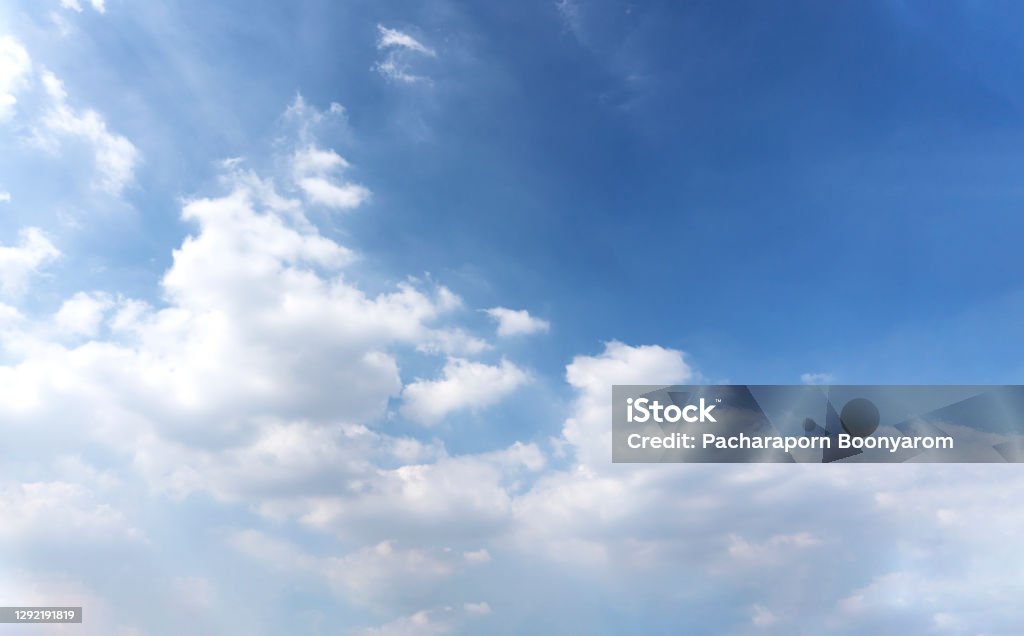 Landscape of the sky with clouds in different shapes, refer to the imagination and creativity freedom and ideas Landscape of the blue sky with clouds in the summer with natural sunlight over the creativity ideas on the abstract wide space background, refer to the hope and freedom of the future Abstract Stock Photo