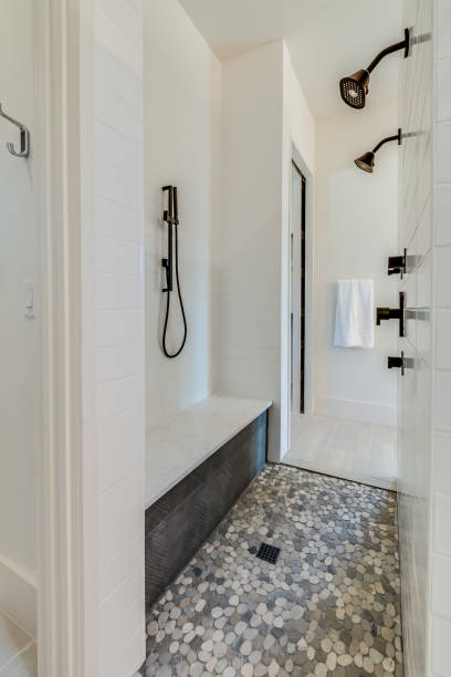 istock Exquisite double entry shower with double shower heads 1292192488