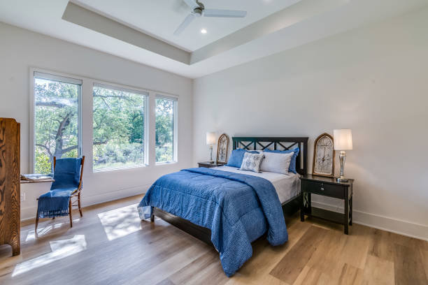 istock Hardwood flooring and coffered ceiling in new home 1292195421