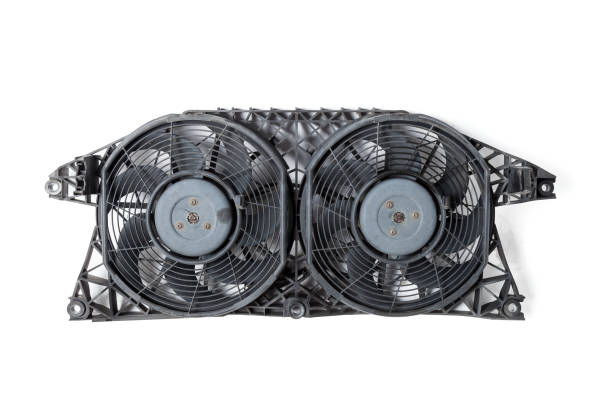 istock Engine radiator cooling fan with two propellers on a white isolated background in a photo studio. Spare part for car repair in a workshop or for sale. Car parts catalog. 1292195766