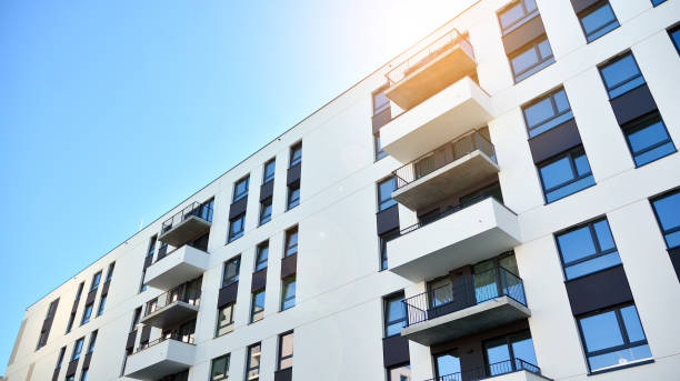 istock Modern apartment buildings on a sunny day with a blue sky. 1292196420