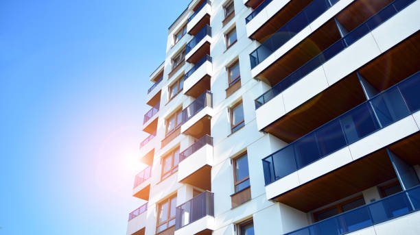 istock Modern apartment buildings on a sunny day with a blue sky. 1292196457