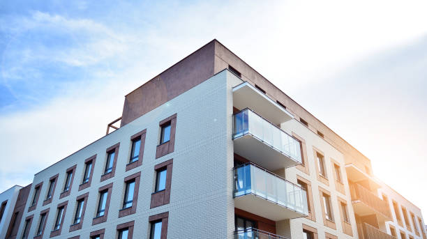 istock Modern apartment buildings on a sunny day with a blue sky. 1292196477