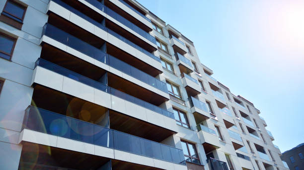 istock Modern apartment buildings on a sunny day with a blue sky. 1292196569