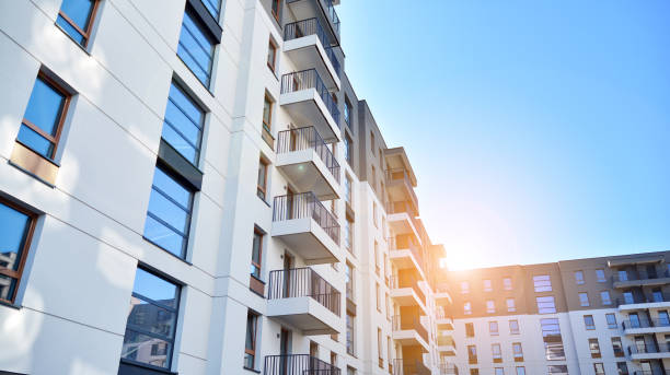 istock Modern apartment buildings on a sunny day with a blue sky. 1292196594