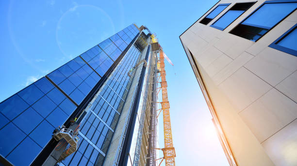 istock Abstract reflection of modern city glass facades. 1292197197