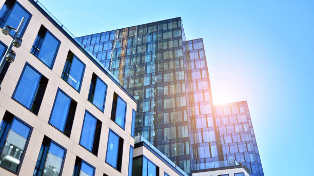 istock Abstract reflection of modern city glass facades. 1292197200