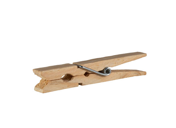 istock Wooden clothespin, isolated on white background. 1292199712