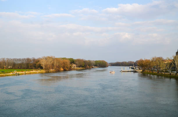 Danube river, near Ruse town, Bulgaria - 4 July, 2023: \nPassenger ship in Danube river before the sunset. Near Ruse town, Bulgaria, Europe.