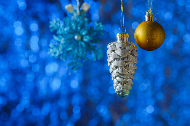 istock Glittering Christmas Bauble Decoration Close up On Abstract Background 1292202858