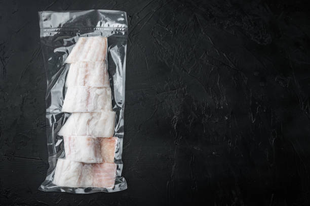 istock Haddock fish skinless in vacuum pack, top view with copy space for text 1292205160
