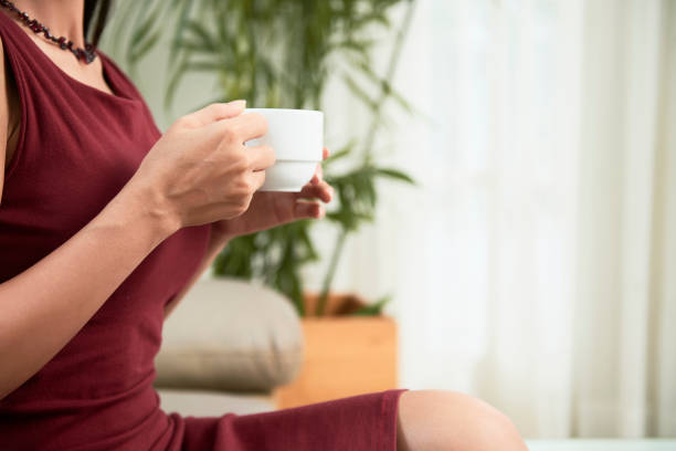 istock Elegant businesswoman with coffee cup 1292206445