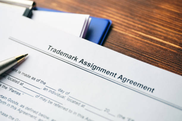 istock Legal document Trademark Assignment Agreement on paper close up 1292209262