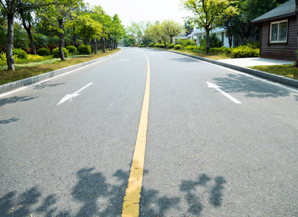 istock Asphalt highway with arrow sign 1292209289