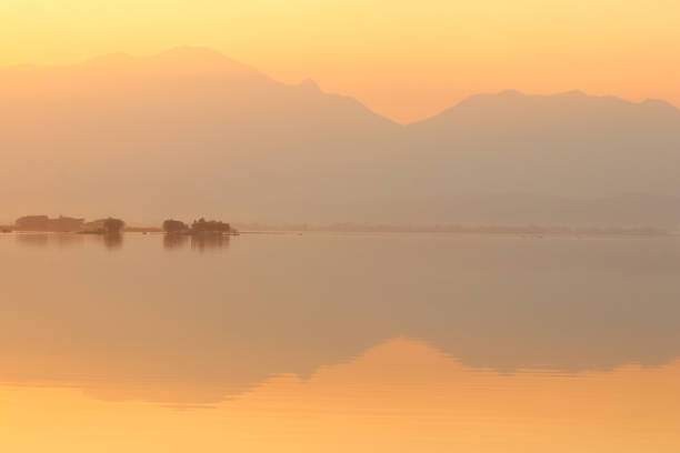 istock beautiful sunset over the lake 1292214184