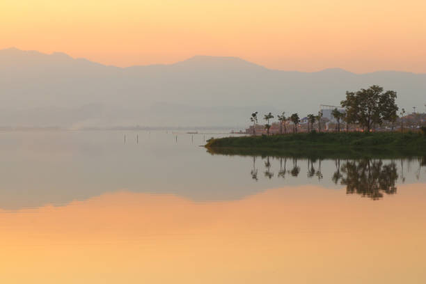 istock beautiful sunset over the lake 1292214313
