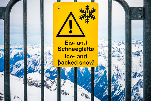 warning sign in winter landscape in Austria