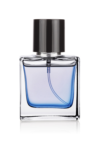 Elegant transparent clean bottle of blue perfume isolated on a white background