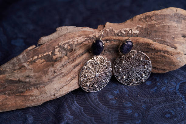 istock Women's precious jewelry accessory. Vintage earrings 1292217625