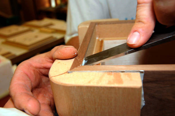 istock Chiseling wood in the carpentry 1292218434