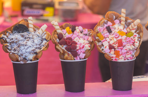 Marshmallow candy in Viennese waffles with berries and chocolate