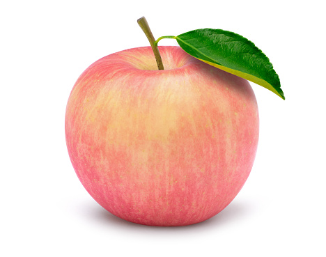 Closeup pink fuji apple with green leaf isolated on white background. Clipping path. Full depth of field.