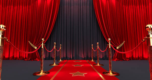 istock Awards show background with red curtains open on Black screen, Long red carpet between rope barriers, 1292224789