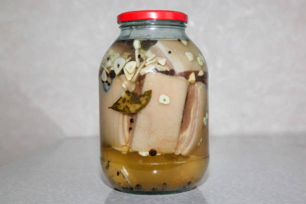 A Close-Up View of Green Tea Brewing in a Glass Teapot