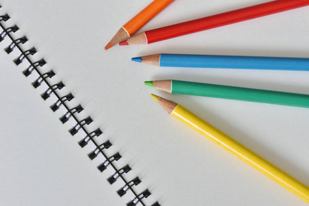 istock Sketchbook and colored pencils 1292229783