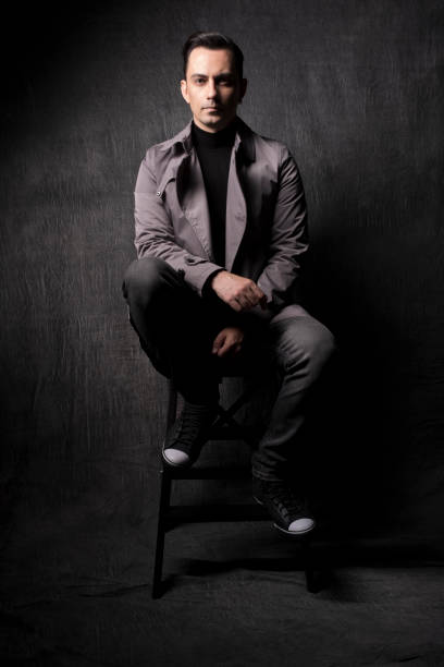 Male model with dark grey background stock photo