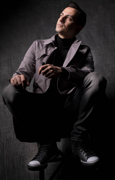 Male model with dark grey background