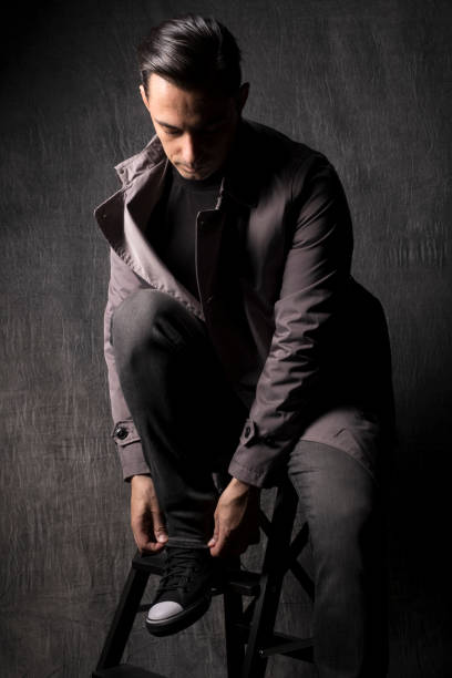 istock Male model with dark grey background 1292230387