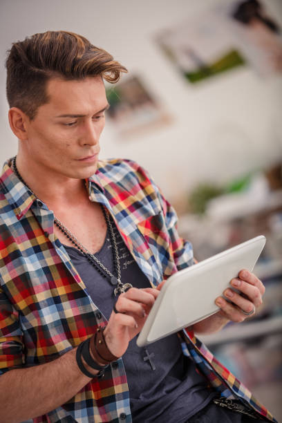 istock Concerned office employee reading something on his tablet device 1292231441