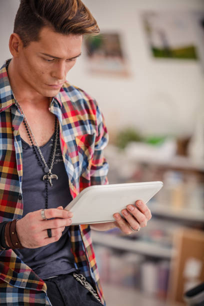 istock Reading an email on the tablet with a thoughtful facial expression 1292231481