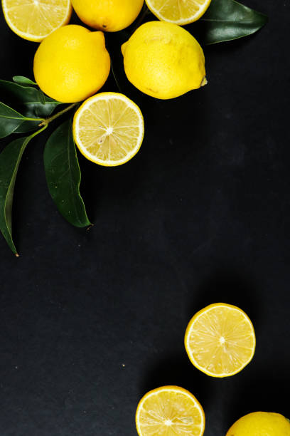 istock Group of lemons with leaves, isolated on background 1292232731