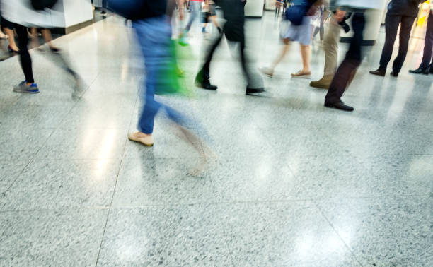 istock Blurred people leg walking in subway station 1292234364