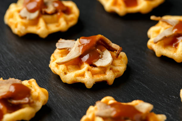 Mini waffle duck party food on rustic stone background