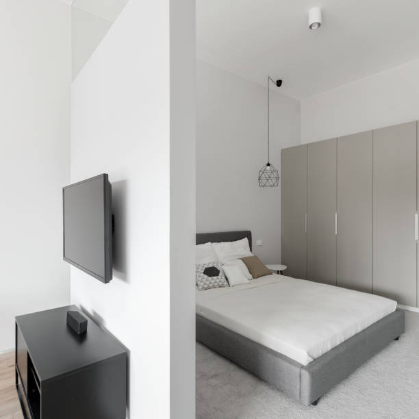 istock Bedroom behind wall with tv screen 1292238778