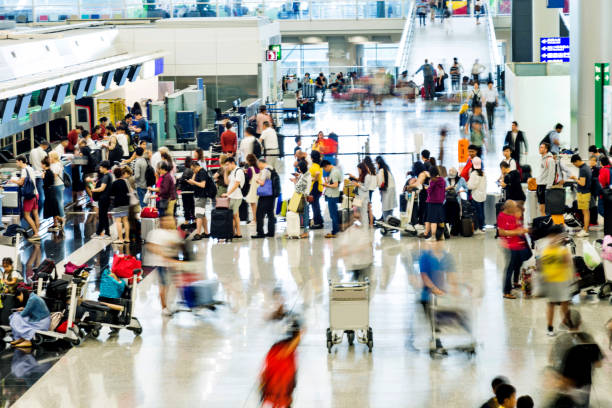 istock Crowd of people waiting for check-in 1292240381
