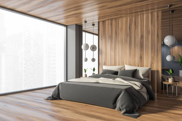 istock Gray and wooden master bedroom corner 1292241571