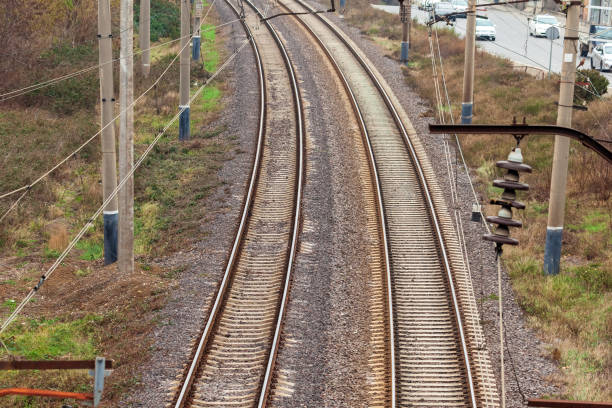 istock Top view to railway tracks, railroad rails 1292243556