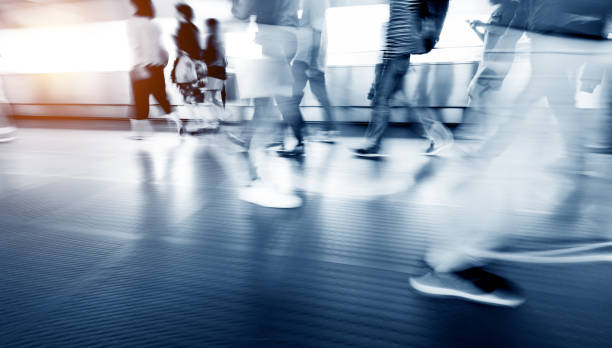 istock People walking in corridor at rush hour 1292244762
