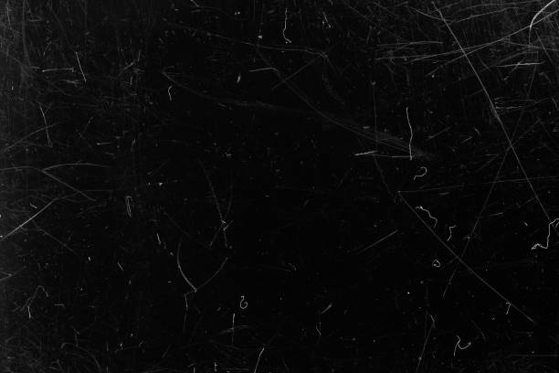 istock Dark scratched grunge background, old film effect, dusty texture 1292246315