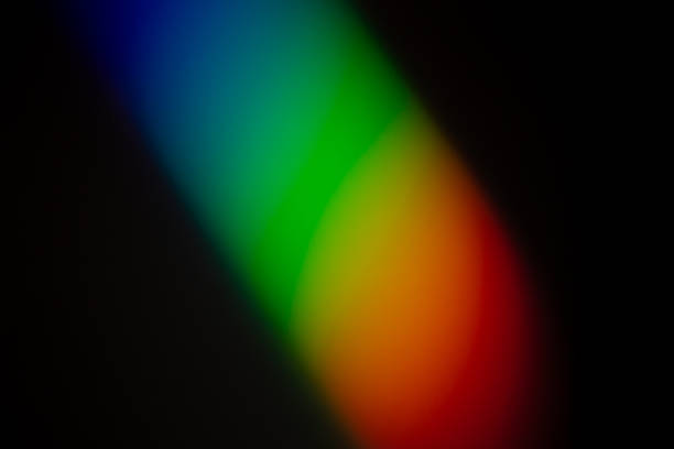 istock A clear and vibrant Rainbow color gradient reflects on a dark wall photograph. 1292247622