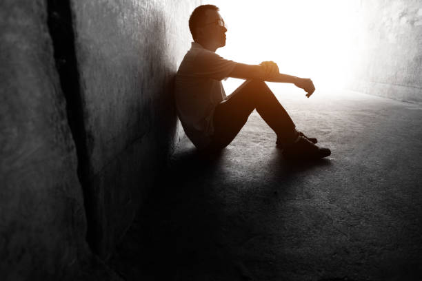 istock Desperate man sitting in the tunnel 1292248280