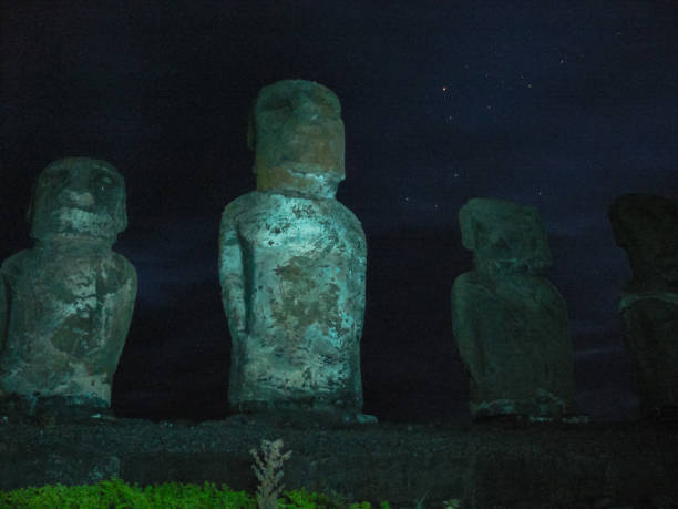 istock Statues Easter Island at night. Ancient statues of ancient civilization 1292256154
