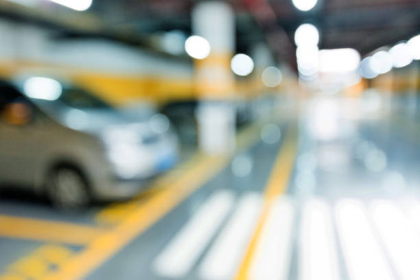 istock Abstract blur of parking garage 1292256272