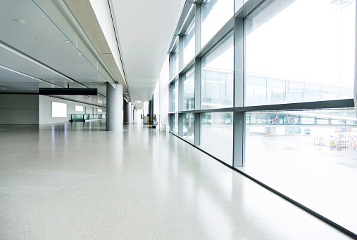 Empty corridor in airport building.