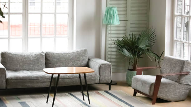 istock Modern empty design living room with couch and armchair 1292260693